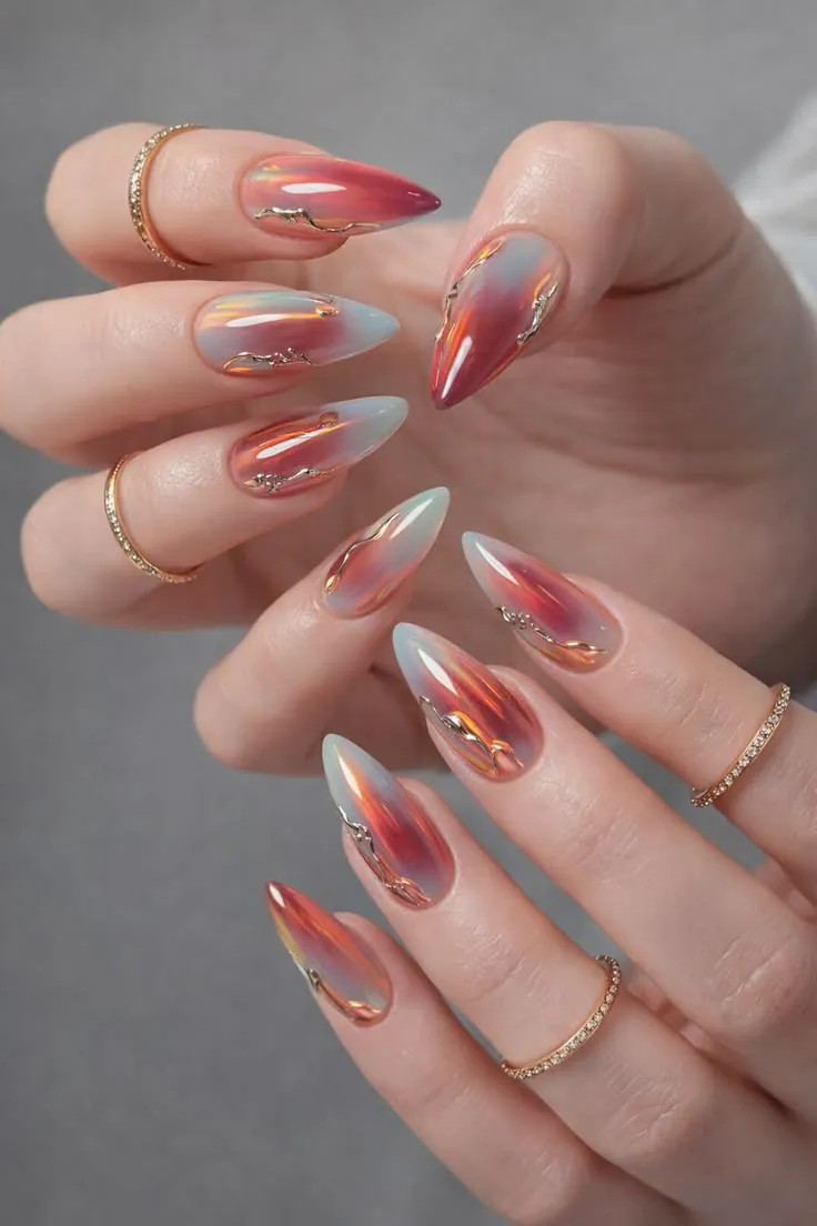 Coral aura chrome almond gel nails with gold foil accents — nail art South Austin 78745 at Le Posh Nail Spa